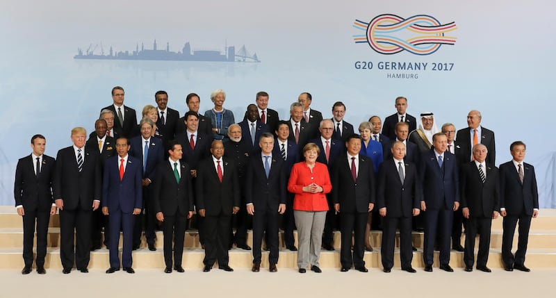 G20 leaders pose for a group photo. AFP Photo