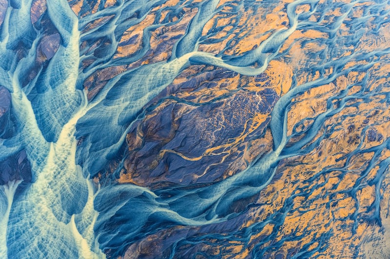 First Place, Water, Kristin Wright, US. Brightly coloured sediment paints the Icelandic landscape.