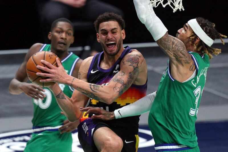 Abdel Nader tries to go up for a shot against the Dallas Mavericks. AP Photo