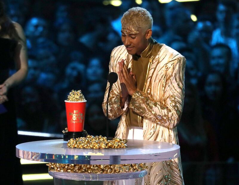 Keiynan Lonsdale accepts the best kiss award for 'Love Simon' AP