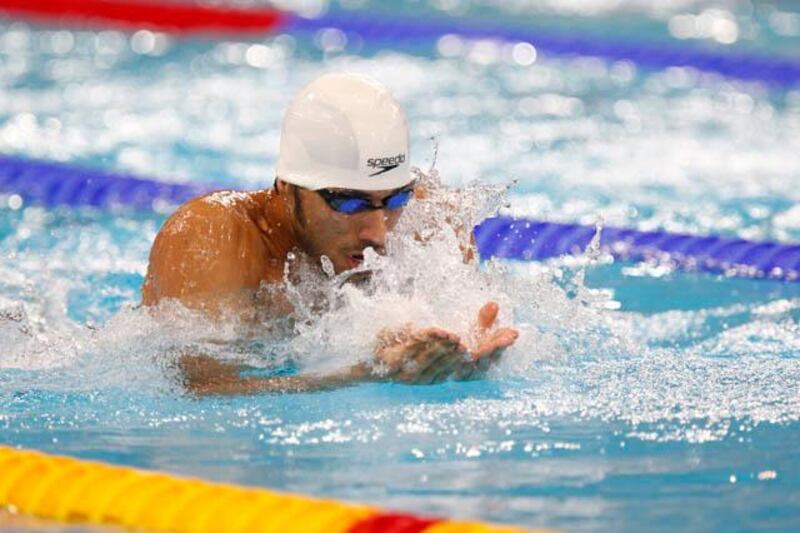 October 08. Mubarab Mohamed Salem Al Besher (UAE) during the mens 100m Breaststroke at the Fina/Arena Swimming World Cup 2011 held at the Hamdan bin Mohammed Al Rashid Sport Complex. October 08, Dubai, United Arab Emirates (Photo: Antonie Robertson/The National)