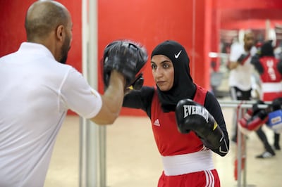 ABU DHABI,  UNITED ARAB EMIRATES , JUNE 16 – 2019 :- Mohammed Al Shebli , National team coach giving boxing training  to Fahima Falaknaz ( right )  at the UAE Boxing Federation HQ located at the Zayed Sports City Football stadium in Abu Dhabi. ( Pawan Singh / The National ) For Sport. Story by Amith