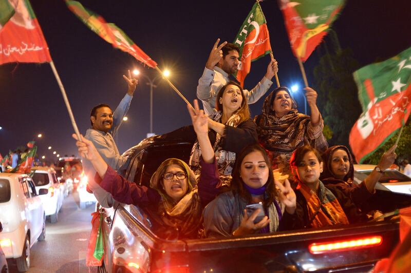 Supporters of the Pakistan Tehreek-e-Insaf party hold a rally in support of former prime minister Imran Khan in Islamabad. AFP