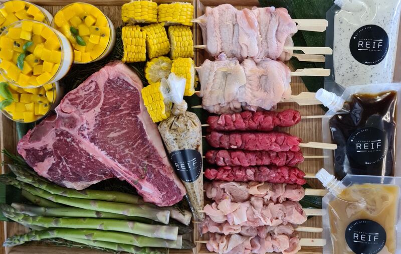 The BBQ box by chef Reif Othman comes with prime cuts, sides such as chicken wings and thighs, sauces such as truffle mayo and yuzu miso, seasonings such as seaweed butter and garnishes such as crispy lotus root.