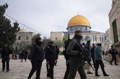 Israeli police escort Jewish visitors to Al Aqsa Mosque compound in the Old City of occupied East Jerusalem. AP