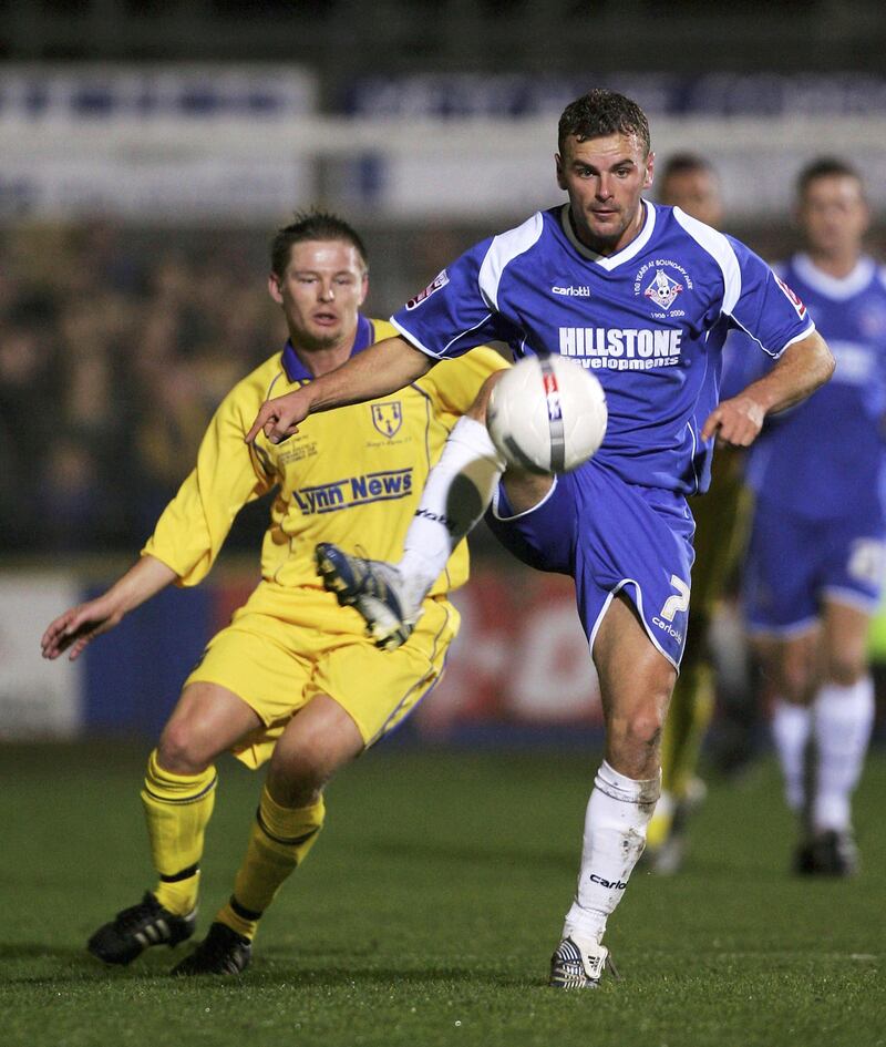 KINGS LYNN, UNITED KINGDOM - DECEMBER 1: Richie Wellens of Oldham wins the ball ahead of Grant Cooper of Kings Lynn during the FA Cup Second Round match between Kings Lynn and Oldham Athletic at The Walks Stadium on December 1, 2006 in Kings Lynn, England. (Photo by Matthew Lewis/Getty Images)