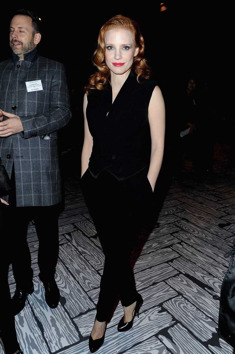 Jessica Chastain, in a black jumpsuit, attends the Viktor&Rolf autumn/winter 2013 show on March 2, 2013 in Paris. Getty Images