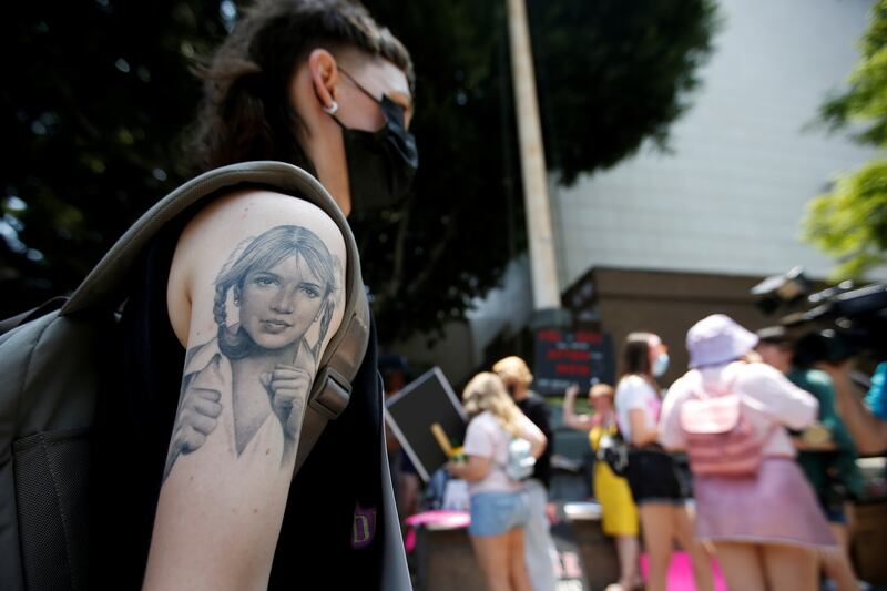 Taylor Coppage takes part in a protest in support of pop star Britney Spears on the day of a conservatorship case hearing at Stanley Mosk Courthouse in Los Angeles, California.