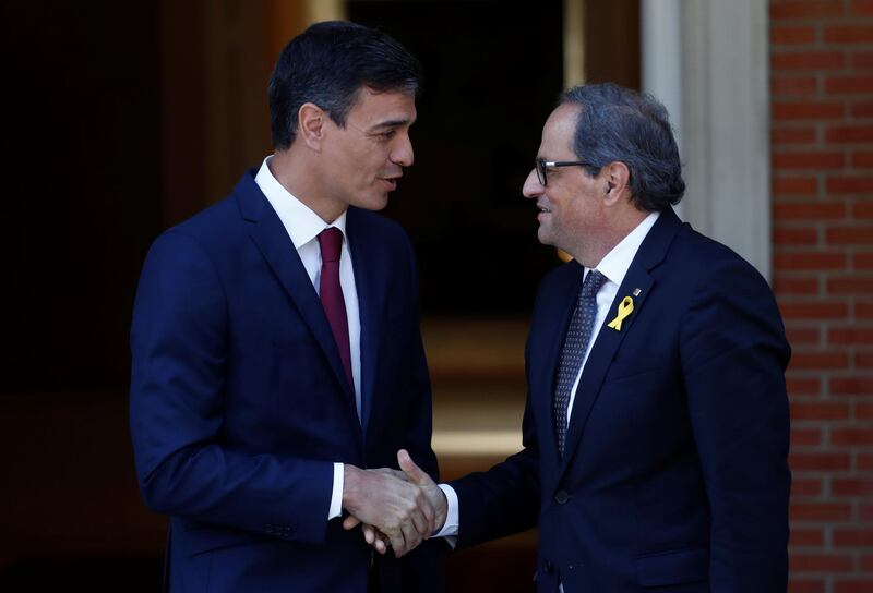 Spain's Prime Minister Pedro Sanchez greets pro-independence Catalan leader Quim Torra at the Moncloa Palace in Madrid, Spain, July 9, 2018.  REUTERS/Juan Medina