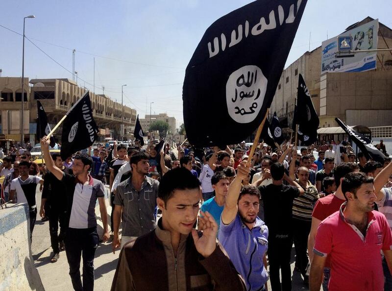 Demonstrators in Mosul chant support for ISIL. Photo: AP