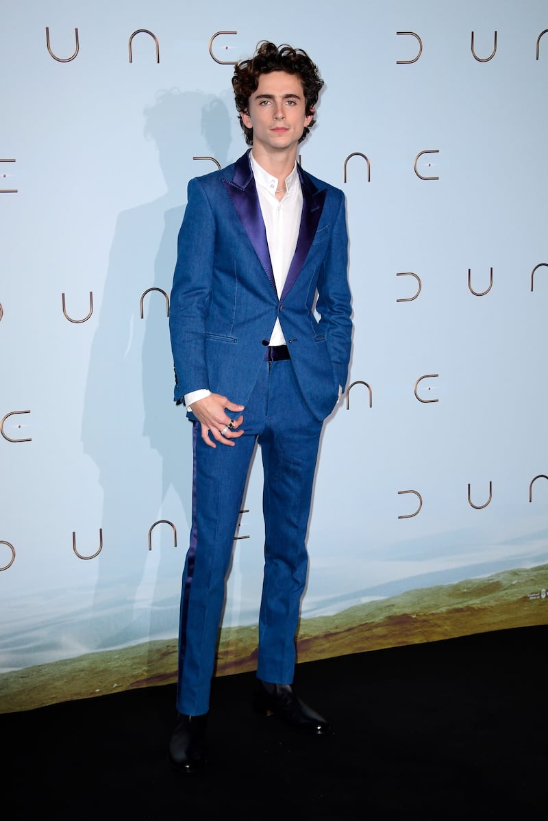 The actor wears blue Tom Ford to a 'Dune' photocall in Paris in September 2021. Getty Images