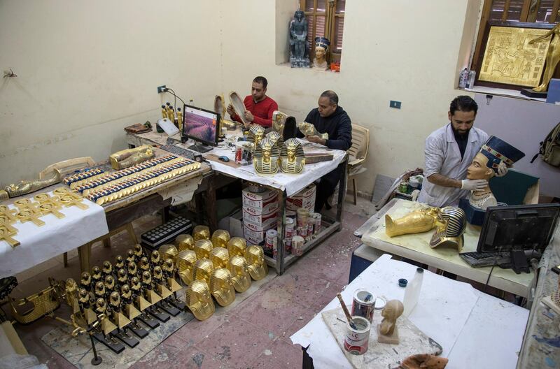 Artists work at the Replica Production Unit located at Salah Al Din Citadel in Cairo, Egypt. EPA
