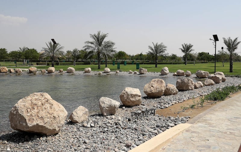 DUBAI ,  UNITED ARAB EMIRATES , AUGUST 26 – 2019 :- View of the pond at the Quranic Park in Dubai. ( Pawan Singh / The National ) For Weekend Postcard. Story by Katy