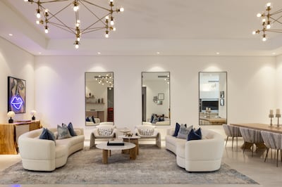 Lohan had the design team put up a trio of mirrors to brighten up the living area. Photo: Blush International