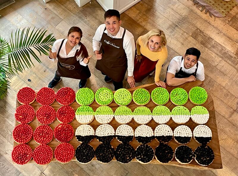 Moundox in Dubai is creating a UAE flag mosaic from complimentary cream and berry cakes