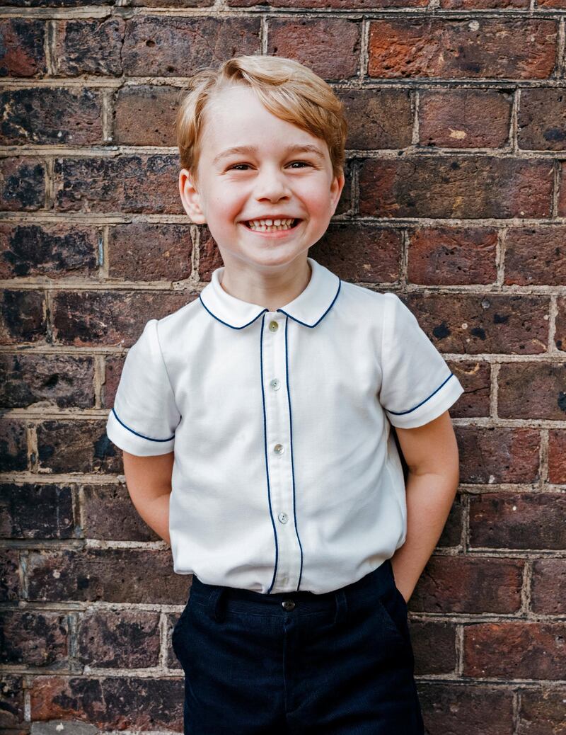 Britain's Prince George, son of Prince William and Catherine, Duchess of Cambridge, poses for a photograph to mark his 5th birthday on Sunday 22nd July, in the garden at Clarence House in central London, Britain, July 9, 2018. Picture taken July 9, 2018. Matt Porteous/Kensington Palace/Handout via REUTERS  - ATTENTION EDITORS - THIS IMAGE HAS BEEN SUPPLIED BY A THIRD PARTY. NO RESALES. NO ARCHIVES. NOT FOR USE AFTER DECEMBER 31, 2018 WITHOUT PRIOR PERMISSION FROM KENSINGTON PALACE. COPYRIGHT IN THE PHOTOGRAPH IS VESTED IN THE DUKE AND DUCHESS OF CAMBRIDGE. THE PHOTOGRAPH MUST NOT BE DIGITALLY ENHANCED, MANIPULATED OR MODIFIED IN ANY MANNER OR FORM.