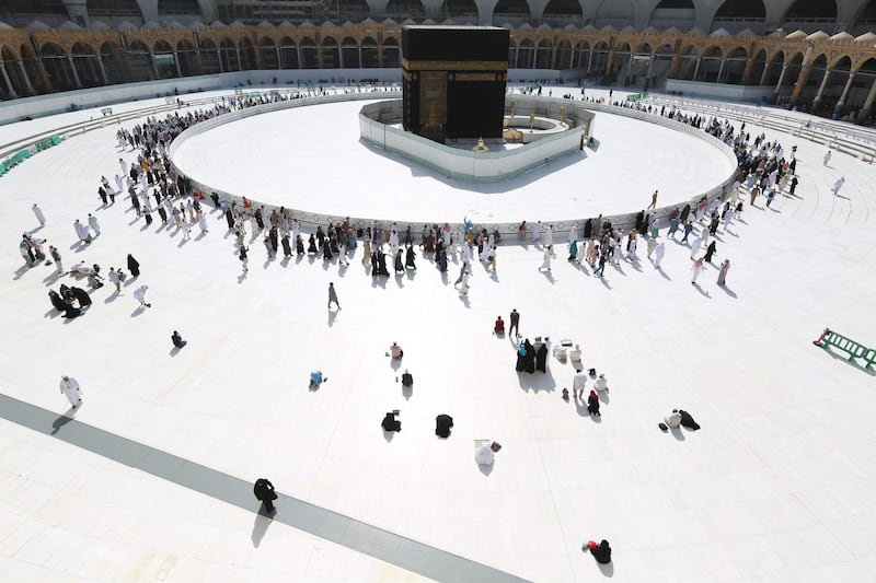 Muslim worshippers circumambulate the sacred Kaaba in Mecca's Grand Mosque, Islam's holiest site. Saudi Arabia reopened the area around the Kaaba.  AFP