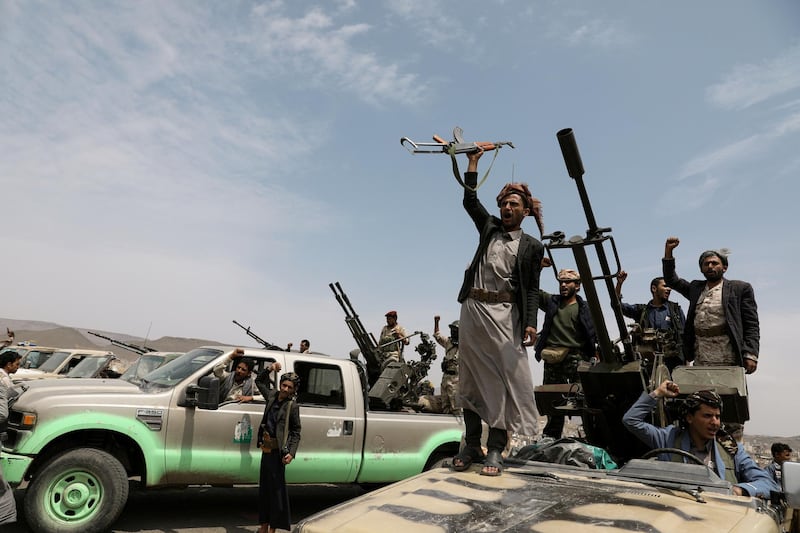 Houthi fighters shout slogans during a gathering of Houthi loyalists on the outskirts of Sanaa, Yemen July 8, 2020. REUTERS/Khaled Abdullah     TPX IMAGES OF THE DAY