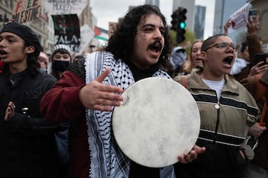 Students and faculty members from the School of the Art Institute of Chicago, Roosevelt College and Columbia College rally in Chicago to show support for the Palestinian people in Gaza. Getty Images via AFP