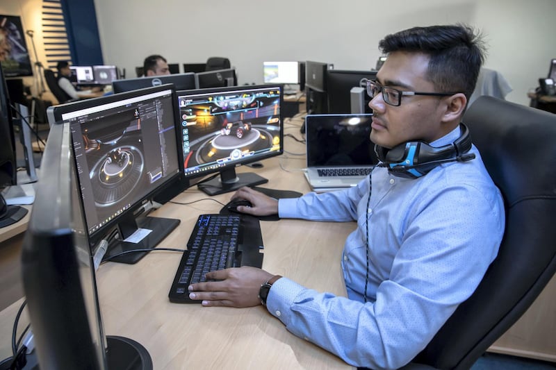 DUBAI, UNITED ARAB EMIRATES. 18 FEBRUARY 2020.  Dubai police’s virtual tech centre develops games to train officers and other to educate the public. Programmer Imran Zahid. (Photo: Antonie Robertson/The National) Journalist: Salam Al Amir . Section: National.
