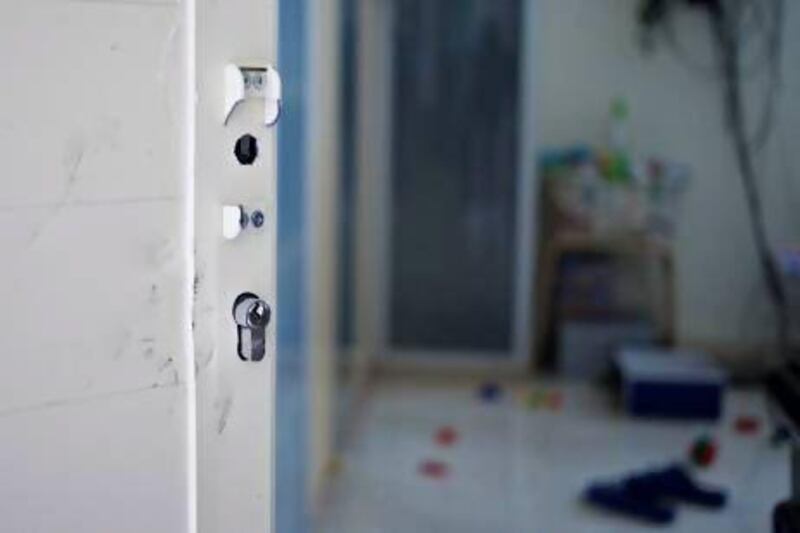 The broken bedroom door lock after Umm Danah’s husband broke in to beat her. Umm Danah has been trying to get a divorce on the grounds of domestic violence but until she does so she and her girls face financial uncertainty – she also fears further attacks from her husband. Razan Alzayani / The National