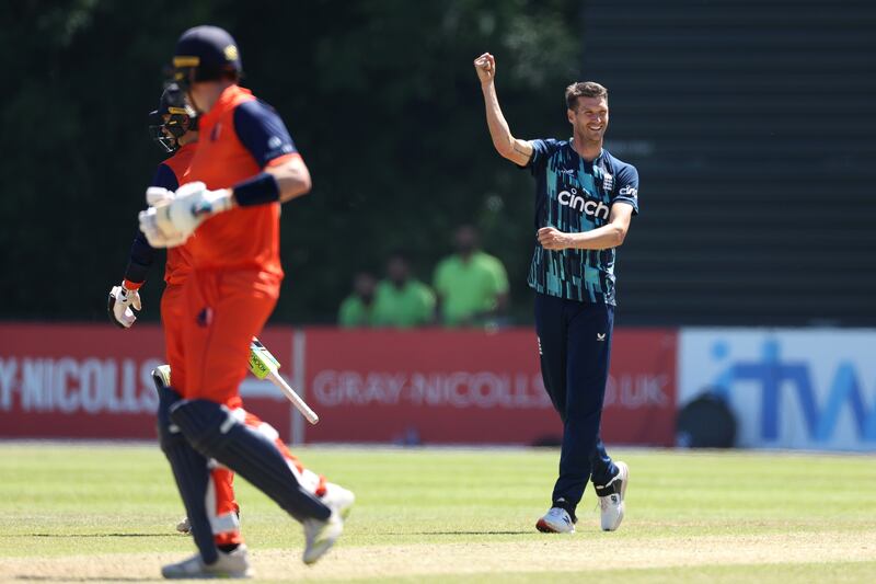 England bowler David Payne celebrates taking the wicket of Scott Edwards for 64. Getty