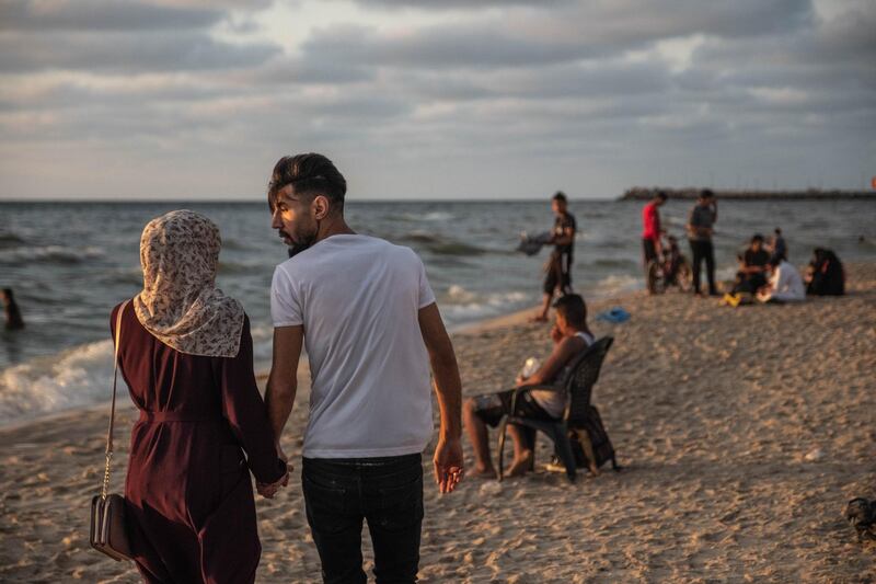 Palestinians enjoy the beach as a ceasefire came into effect in Gaza City. Getty Images