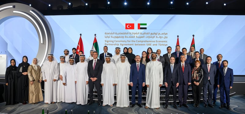 Mr Bin Touq, Mr Mus and Dr Al Zeyoudi, Saeed Thani Hareb Al Dhaheri, the UAE's ambassador to Turkey, and other dignitaries during the signing ceremony. Photo: Hamad Al Kaabi / UAE Presidential Court 
