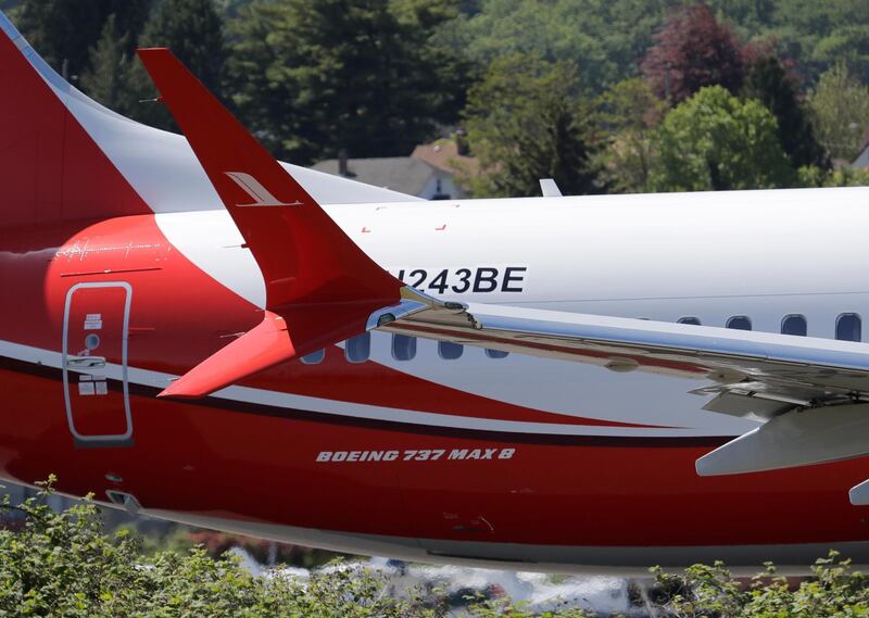 A Shanghai Airlines Boeing 737 MAX 8 jetliner taxis before a test flight, Wednesday, May 8, 2019, in Renton, Wash. Passenger flights using the plane remain grounded worldwide as investigations into two fatal crashes involving the airplane continue. (AP Photo/Ted S. Warren)