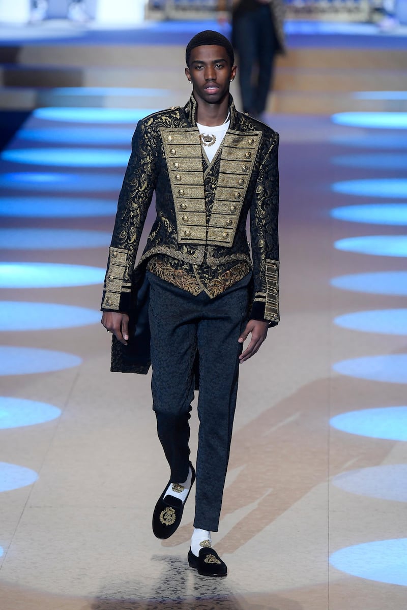 Christian Combs, the son of P Diddy, presents a creation for fashion house Dolce & Gabbana during the Men's Fall/Winter 2019 fashion shows in Milan, on January 13, 2018. (Photo by Marco BERTORELLO / AFP)