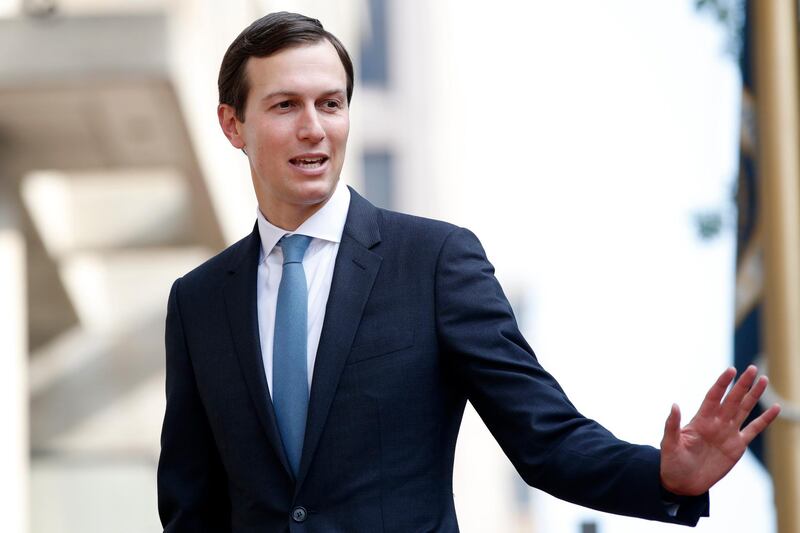 FILE - In this Aug. 29, 2018 file photo, White House Adviser Jared Kushner waves as he arrives at the Office of the United States Trade Representative in Washington. Kushner is in Jordan Wednesday, May 29, 2019, as he tries to rally Arab support for a U.S. peace conference next month in Bahrain. Jordan, a key U.S. ally, has not yet said whether it will attend. Kushner said the conference will focus on the economic foundations of peace between Israel and the Palestinians and will not include core political issues, such as Palestinian statehood. The Palestinians have rejected the conference. (AP Photo/Jacquelyn Martin, File)