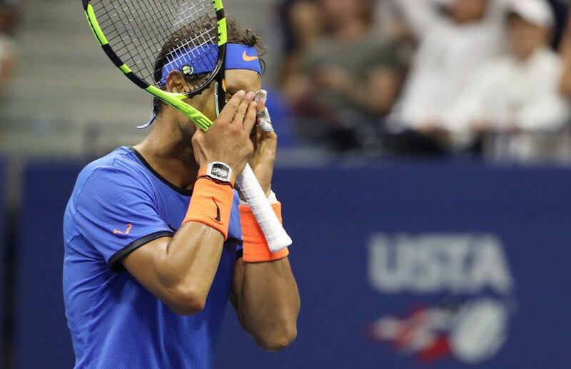 Rafael Nadal is downtrodden after a point for Lucas Poille during their US Open match on Sunday. Andrew Gombert / EPA