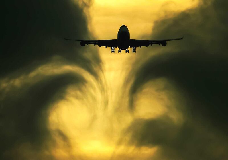 RG9PAY The turbulence of the clouds left by the plane during the flight. Alamy