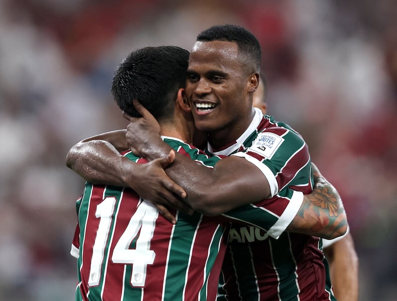 Fluminense's Jhon Arias, right, celebrates with German Cano after scoring their first goal. Reuters