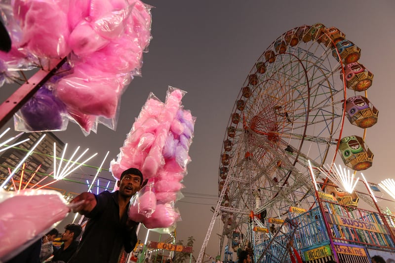 An amusement park during the Mahim Fair in Mumbai. The International Monetary Fund expects India's growth to remain strong, supported by macroeconomic and financial stability. EPA