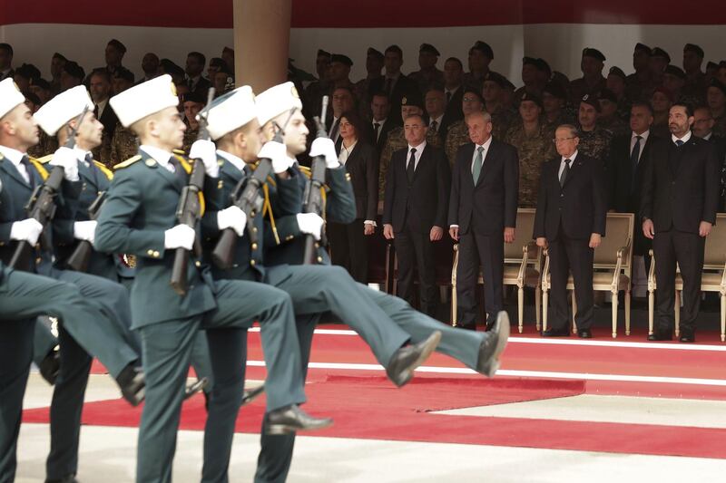 From right: Mr. Hariri, Mr. Aoun, Mr. Berri, Defense Minister Elias Bou Saab and Interior Minister Raya El Hassan attend a military parade. AP Photo