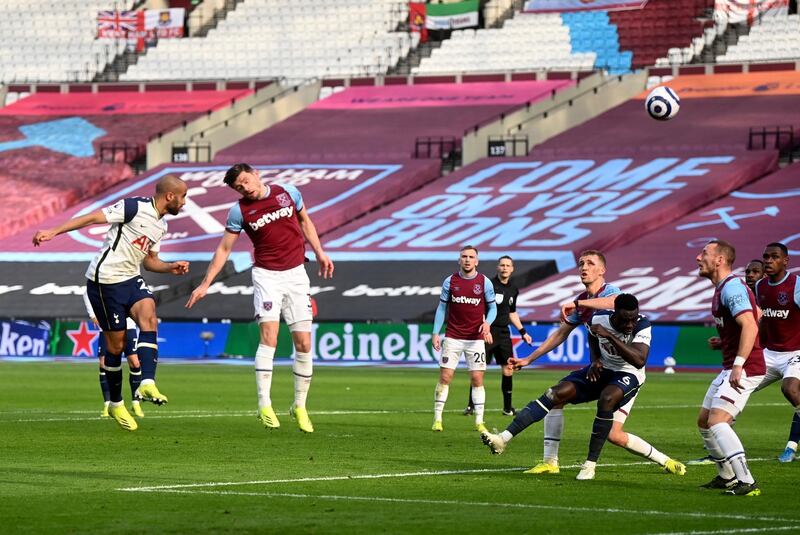 Tottenham's Lucas Moura, left, scores his side's opening goal at the London Stadium. AP