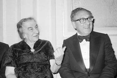 FILE - Former U. S.  Secretary of State Henry Kissinger and former Israeli Prime Minister Golda Meir chat after an American Jewish Congress Dinner, Sunday night Nov.  4, 1977, in New York.  Former Secretary of State Henry Kissinger, the diplomat with the thick glasses and gravelly voice who dominated foreign policy as the United States extricated itself from Vietnam and broke down barriers with China, died Wednesday, Nov.  29, 2023, his consulting firm said.  He was 100.  (AP Photo / Ira Schwarz, File)