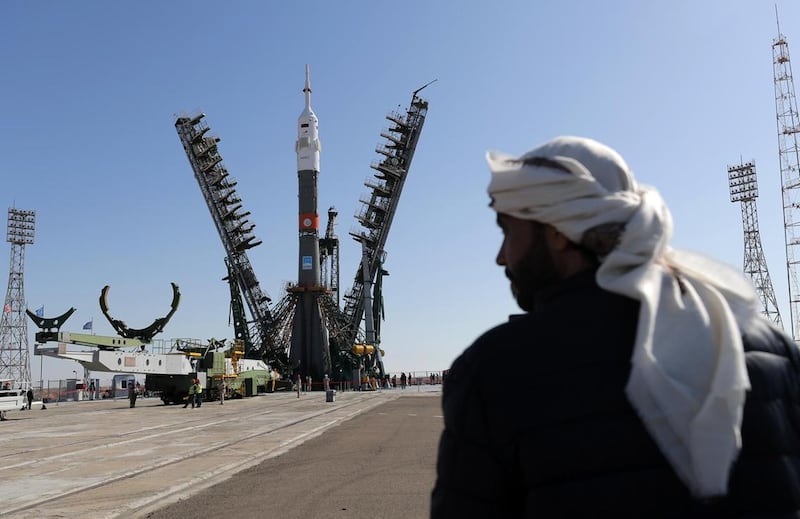 An Emirati official looks on as the MS-15 spacecraft and the rocket carrying it is installed on the launch pad at the Baikonur Cosmodrome in September 2019, ahead of its launch. EPA