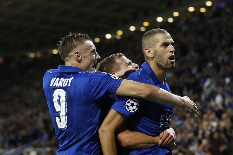 Leicester City’s Islam Slimani celebrates with Jamie Vardy after scoring their first goal. Carl Recine / Reuters