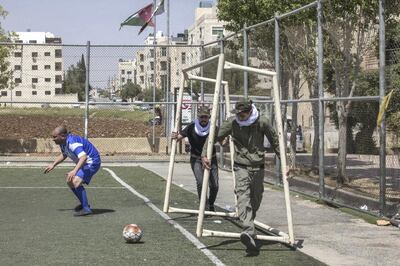 Actors working for the Al Basheer Show play a scene in Amman, Jordan, on May 8th, 2017. The scene makes fun of an Iraqi militia which recently started its own football team in Baghdad, Iraq. An Iraqi comedy broadcast on YouTube and Deutsche Welle (DW), the Al Basheer Show is a satirical and entertaining look politics and daily life in Iraq using comedy sketches and humorous songs. Today Al Basheer Show is one of the most successful comic productions of the Arab world. Relocated in the Jordanian capital since 2012 to regain the freedom to criticize political power that does not hesitate to persecute and imprison critics, Ahmed Al Basheer is fighting for a liberal Iraq, without terror or violence, where different faiths - Christians, Kurds Sunni and Shi'ite - could live in plurality. Forever marked by a suicide attack on February 24th, 2011, in the heart of his hometown of Ramadi, 100 km from Baghdad, where he was spared but which cost the lives of seven of his colleagues, neighbors and friends, Ahmed Al Basheer vowed to engage in a battle against obscurantism, using the sharp edge of humor, biting parody and media power.