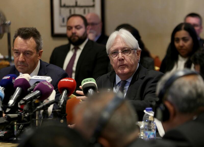 FILE - In this Feb. 5, 2019 file photo, United Nations Special Envoy to Yemen Martin Griffiths, center, and President of the International Committee of the Red Cross Peter Maurer, speak during a new round of talks by Yemen's warring parties in Amman, Jordan.  Yemenâ€™s warring sides on Friday, Sept. 18, 2020,  started U.N.-brokered peace consultations in Switzerland to exchange prisoners, the United Nations said, part of a long-delayed deal aiming to end a conflict that has killed thousands of civilians and set off the worldâ€™s worst humanitarian crisis. (AP Photo/Raad Adayleh)