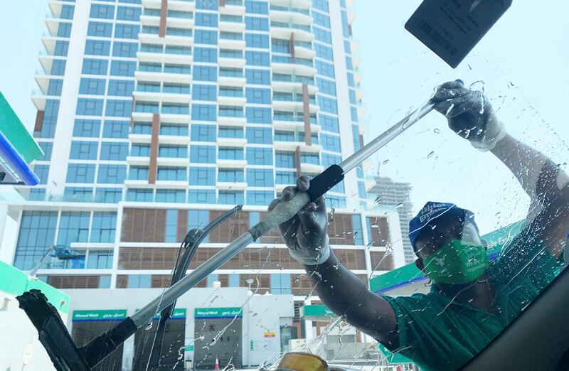 DUBAI, UNITED ARAB EMIRATES , October 10 – 2020 :- Attendant of Emarat gas station wearing protective face mask as a preventive measure against the spread of coronavirus in Dubai. (Pawan Singh / The National) For News/Stock/Online.