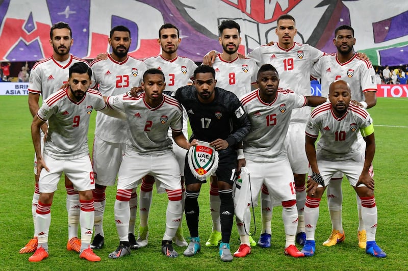 (Top L to R) United Arab Emirates' forward Ali Mabkhout, United Arab Emirates' defender Mohamed Ahmed, United Arab Emirates' defender Walid Abbas, United Arab Emirates' midfielder Majed Hassan, United Arab Emirates' defender Ismail Ahmed, United Arab Emirates' defender Fares Al Saadi, (bottom) United Arab Emirates' defender Bandar Al Ahbabi, United Arab Emirates' midfielder Ali Salmeen, United Arab Emirates' goalkeeper Khalid Eisa Mohamed, United Arab Emirates' midfielder Ismail Al Hamadi and United Arab Emirates' forward Ismaeil Al Junaibi pose for a group picture during the 2019 AFC Asian Cup quarter-final football match between UAE and Australia at Hazaa bin Zayed Stadium in Al-Ain on January 25, 2019.  / AFP / Giuseppe CACACE
