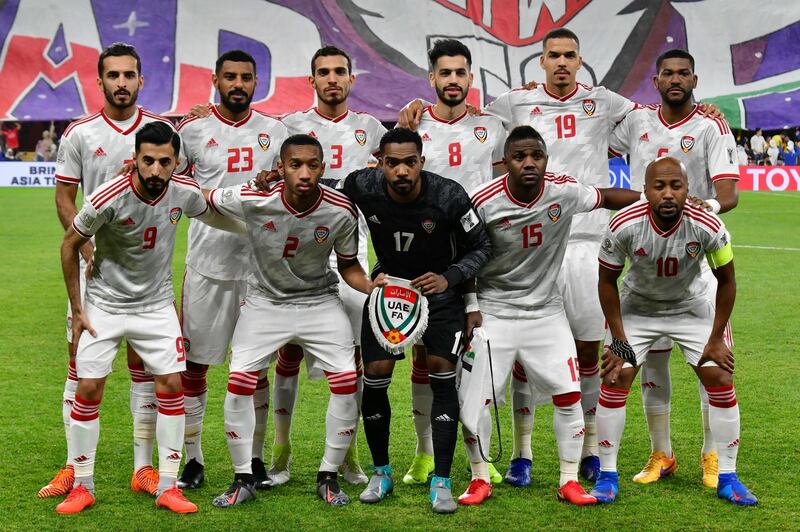 (Top L to R) United Arab Emirates' forward Ali Mabkhout, United Arab Emirates' defender Mohamed Ahmed, United Arab Emirates' defender Walid Abbas, United Arab Emirates' midfielder Majed Hassan, United Arab Emirates' defender Ismail Ahmed, United Arab Emirates' defender Fares Al Saadi, (bottom) United Arab Emirates' defender Bandar Al Ahbabi, United Arab Emirates' midfielder Ali Salmeen, United Arab Emirates' goalkeeper Khalid Eisa Mohamed, United Arab Emirates' midfielder Ismail Al Hamadi and United Arab Emirates' forward Ismaeil Al Junaibi pose for a group picture during the 2019 AFC Asian Cup quarter-final football match between UAE and Australia at Hazaa bin Zayed Stadium in Al-Ain on January 25, 2019.  / AFP / Giuseppe CACACE
