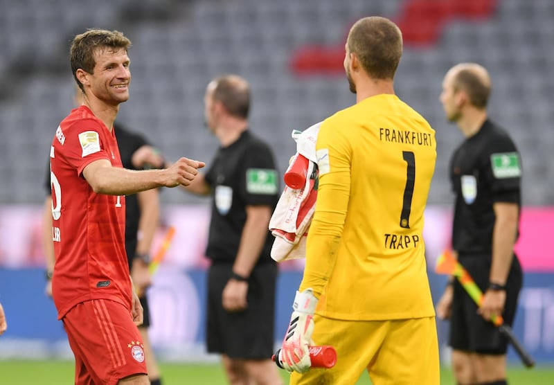 Bayern Munich's Thomas Muller with Manuel Neuer after the win over Frankfurt. Reuters