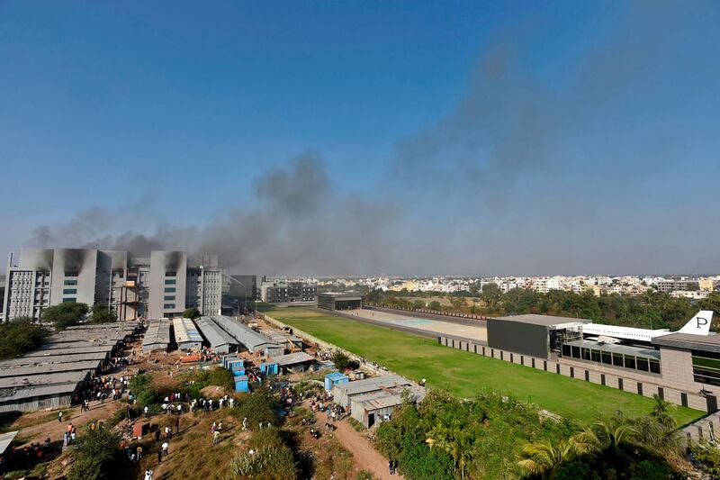 Smoke rises after a fire broke out at India's Serum Institute in Pune. AFP
