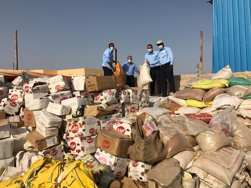Fourteen tonnes of expired food and cosmetics were seized from a Sharjah warehouse on Monday. Sharjah Municipality