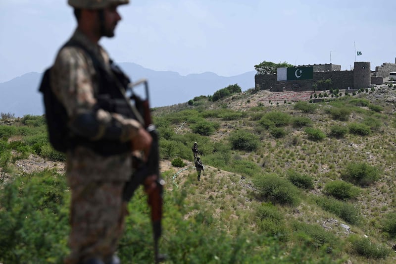 Pakistani soldiers patrol along the border with Afghanistan border in Khyber Pakhtunkhwa province. AFP
