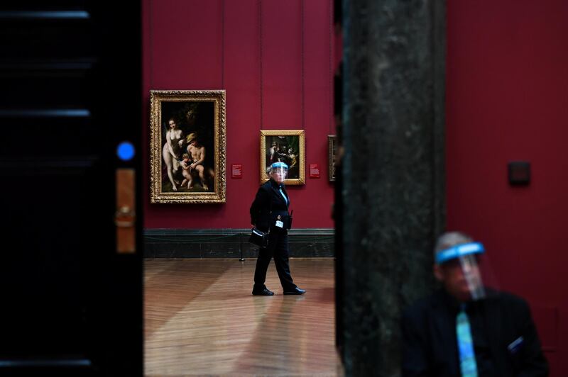 Security guards wear protective face shields as The National Gallery prepares to open its doors to the public this week. Reuters